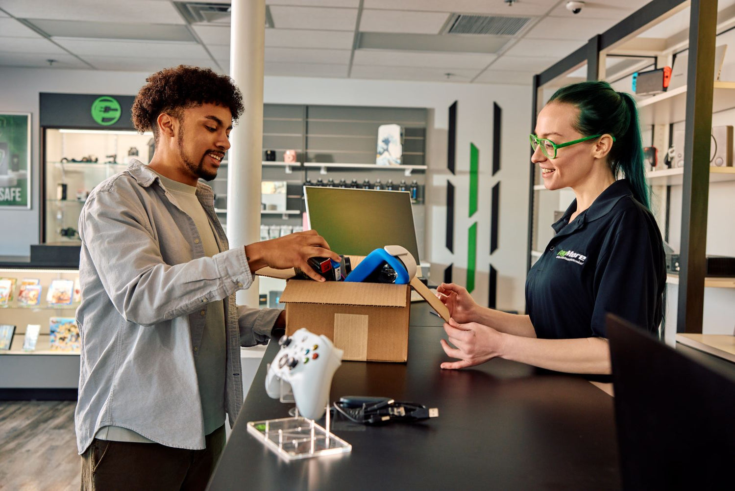 paymore employee inspecting electronics