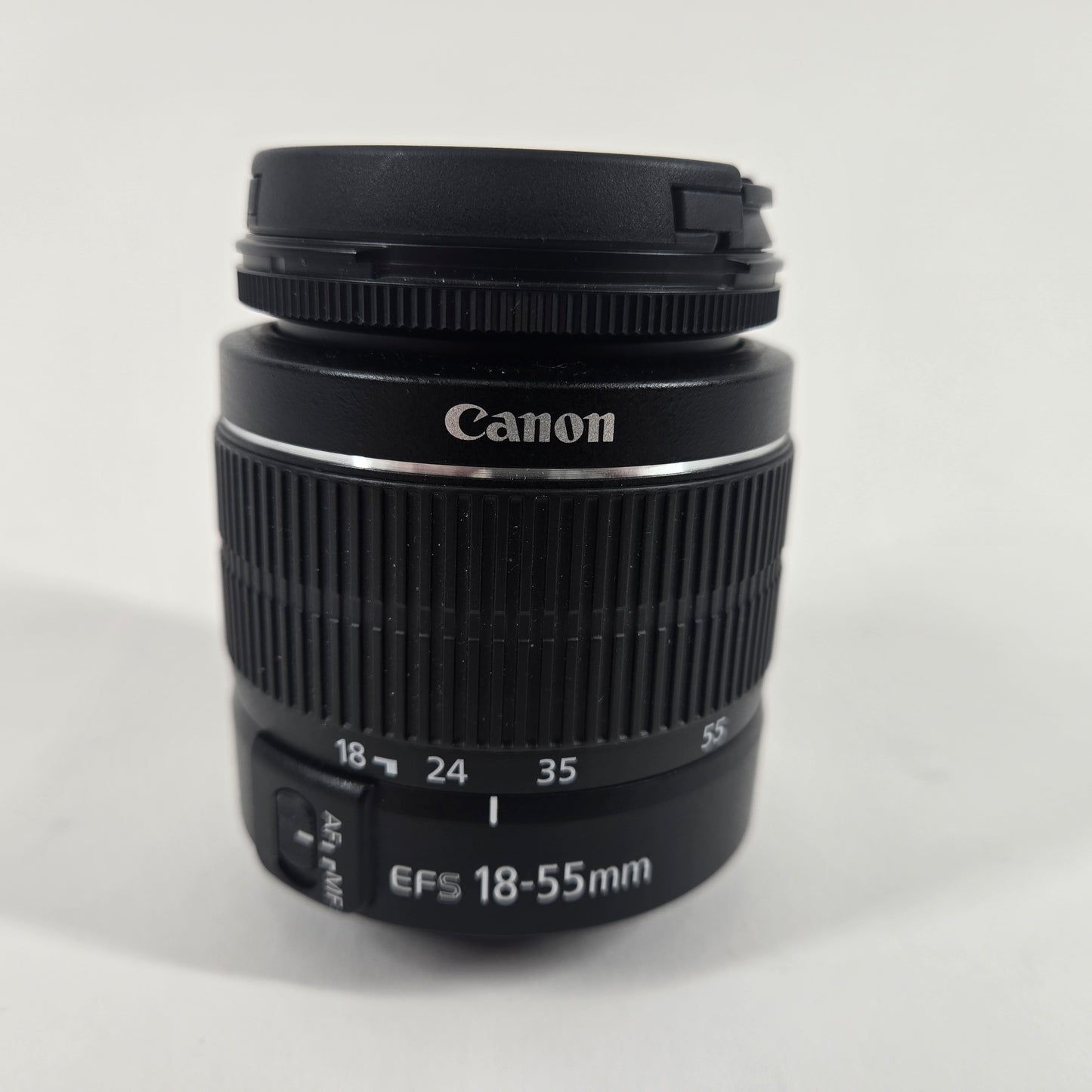 Canon EOS Rebel T100 18.0MP Digital SLR DSLR Camera with Canon EFS 18-55mm