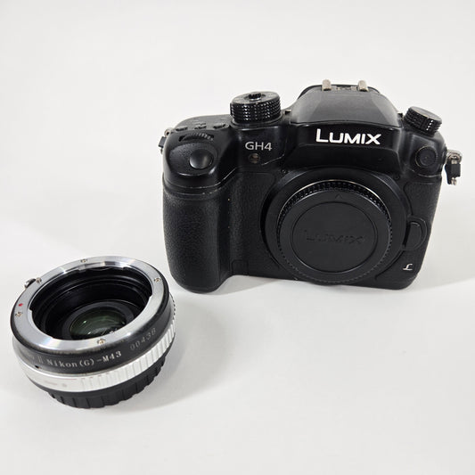 Panasonic Lumix GH4 DMC-GH4 16.05 Digital Camera with Lens Adapter